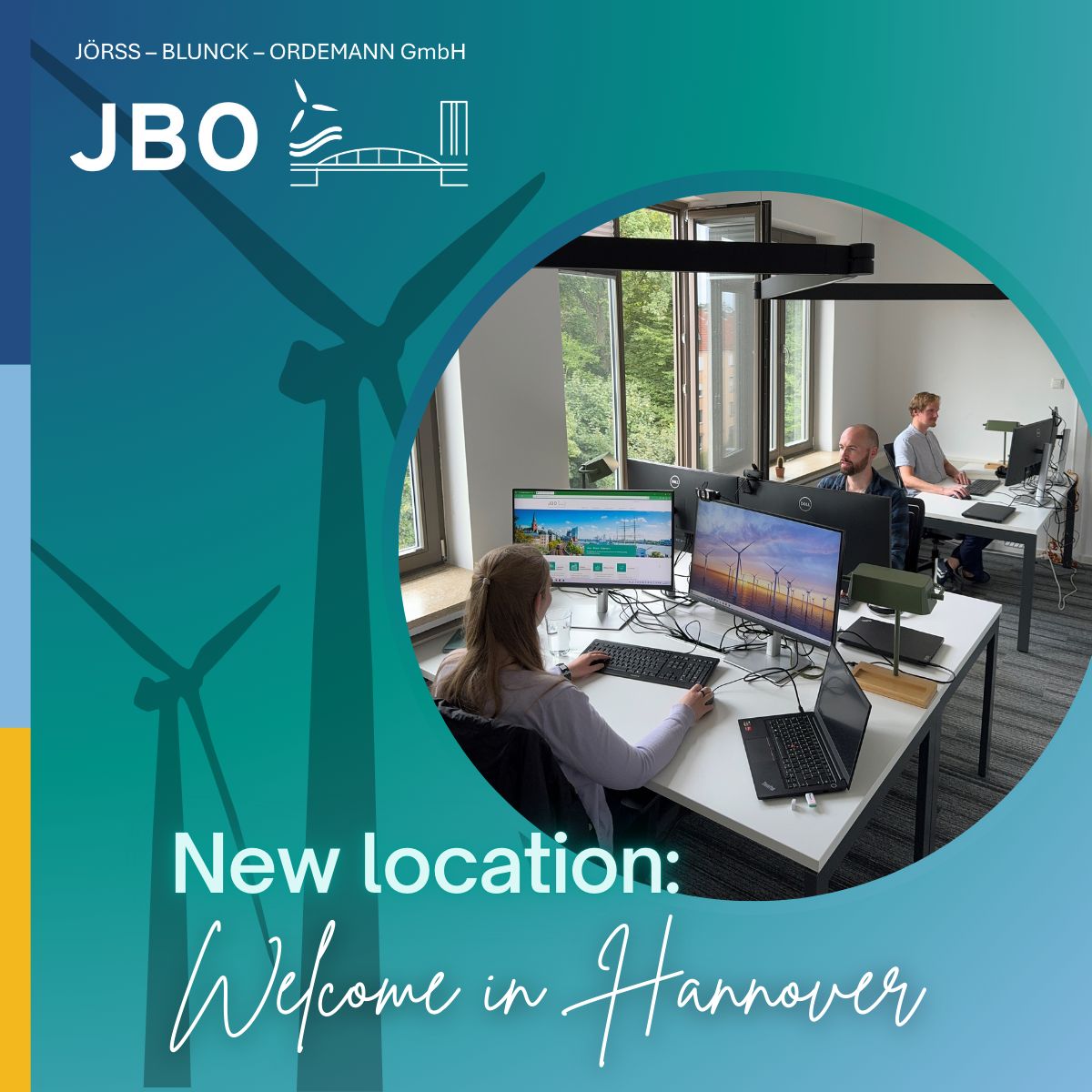 Three people work at desks with computers in a modern office space, with large windows. Text reads: "New location: Welcome in Hannover.